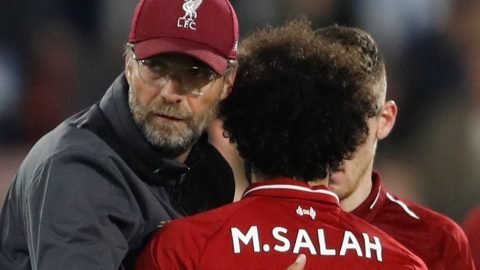 Salah scores as Liverpool beat Huddersfield to keep pace with leaders