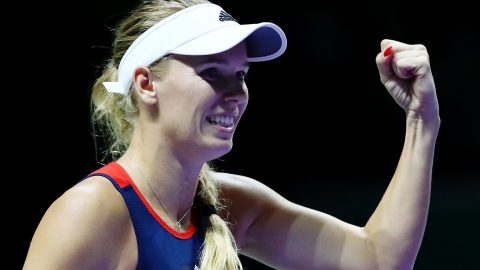 WTA Finals: Defending champion Caroline Wozniacki beats Petra Kvitova in Singapore