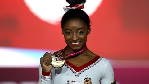 Simone Biles: Gymnast wins record 13th world title