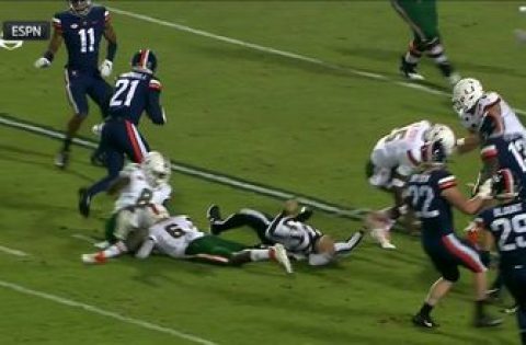 Referee takes massive, scary hit in Miami-Virginia but gets up and stays in the game