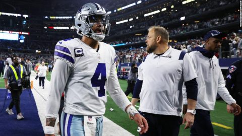 Dallas Cowboys star Dak Prescott apologizes for praising fans who threw trash at officials after playoff loss
