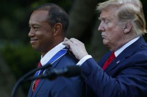 The Latest: Trump awards Medal of Freedom to Tiger Woods