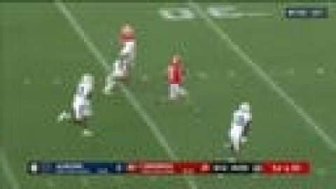 Georgia’s Stetson Bennett speeds past defenders for a 64-yard rushing touchdown against Auburn