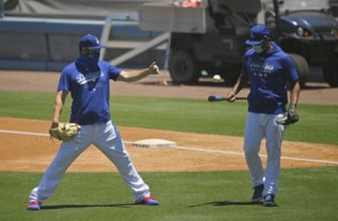 Who are those masked men? Dodgers resume camp with new rules
