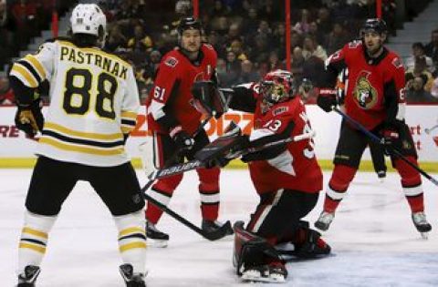 Krug scores in OT to lift Bruins over Senators 2-1