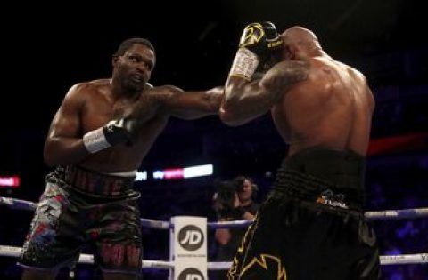 Whyte survives knockdown to beat Rivas