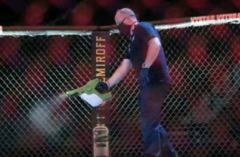 UFC 249 ushers in fan-free, mask-filled era of sports