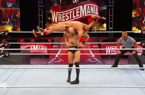 Cesaro takes down Drew Gulak with a no-hand airplane spin on the WrestleMania kick off show