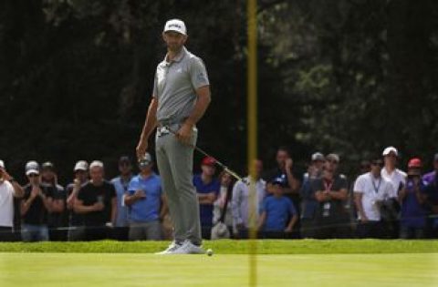 Johnson builds 2-shot lead in Mexico as Woods rallies