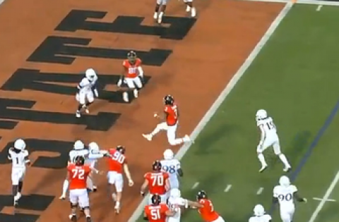 Oklahoma State’s Spencer Sanders rushes for a four-yard TD, Cowboys lead Kansas, 7-0