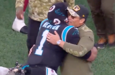 Cam Newton and Ron Rivera embrace postgame at midfield after Panthers and Washington Football Team square off