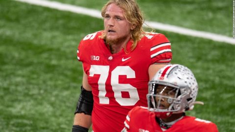 Ohio State offensive lineman Harry Miller says he is medically retiring from football, citing mental health struggles