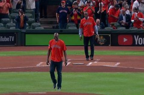 Watch Hakeem Olajuwon throw out first pitch at World Series Game 6 to Clyde Drexler