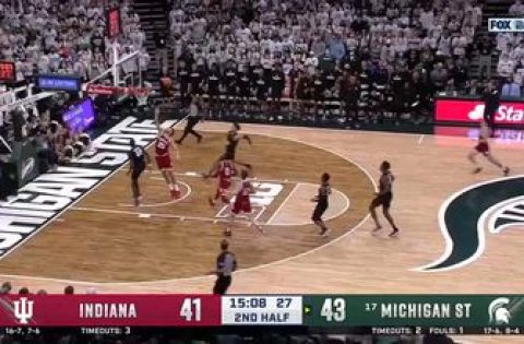 Michigan State’s Malik Hall throws down the monster jam off an alley-oop from Gabe Brown