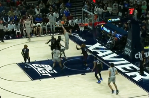 Xavier’s Jack Nunge soars to the rim for a massive slam
