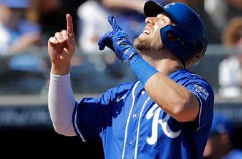 Royals score nine runs, hold on to beat Padres 9-7