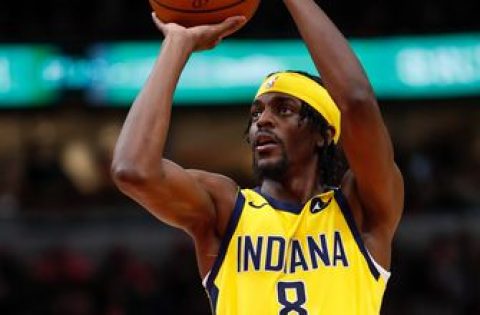 Pacers re-sign Justin Holiday