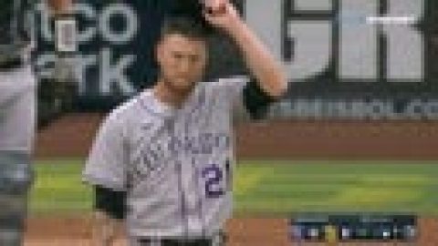 Rockies’ Sam Hilliard takes a home run away from Brandon Drury with a leaping grab at the wall
