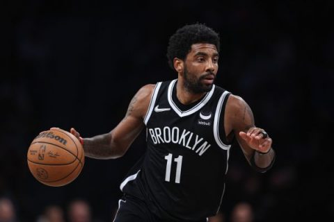 Irving says he’s returning to Nets next season