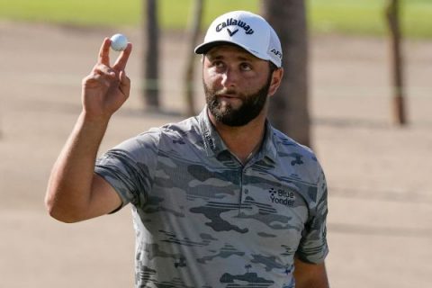 Rahm sinks 8 birdies, goes up 2 shots in Mexico