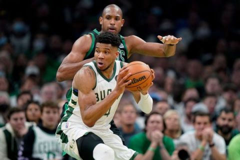 Giannis gets creative, quiets C’s with triple-double