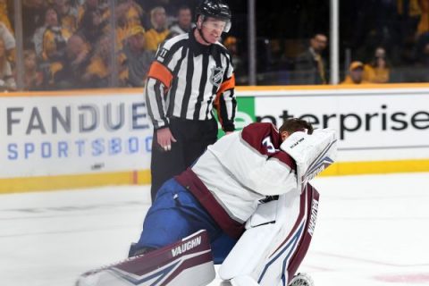 Avs G Kuemper exits after stick hits him in face