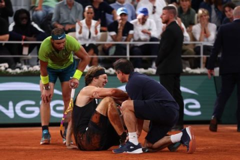 Nadal into French Open final after Zverev retires