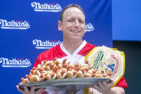 Chestnut’s 63 hot dogs enough for 15th title