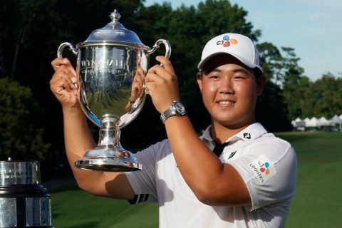 Kim, 20, earns PGA card after 61 to win Wyndham