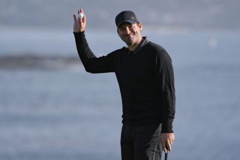 Romo withdraws from Pebble for Wilson funeral