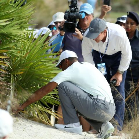 Tiger didn’t know he hit ball twice, avoids penalty