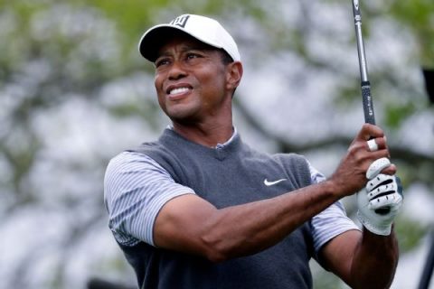 Tiger’s hole-out eagle leads to match-play win
