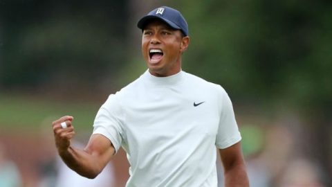 A run-in with security, a weather delay and a late charge: Tiger’s wild day at Augusta