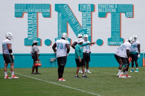 Dolphins fire O-line coach one week into camp