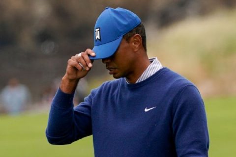 Tiger ‘a little hot’ after poor finish to Open round
