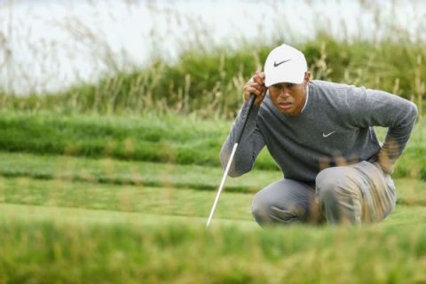 ‘Achy’ Tiger uneven again, well behind after 71