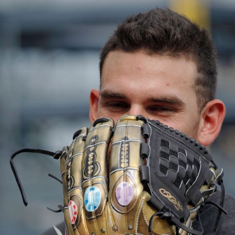 Joe Musgrove shows off his Avengers-themed glove before Monday’s game vs. the Brewers