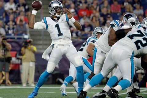 Panthers’ Newton exits with foot injury after sack