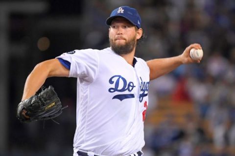 Kershaw (stiff back) out vs. Giants, placed on IL