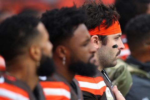 Mayfield reverses course, to stand for anthem