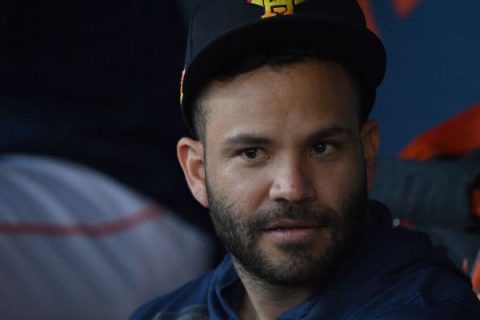 Altuve grazed by pitch, Astros booed on road