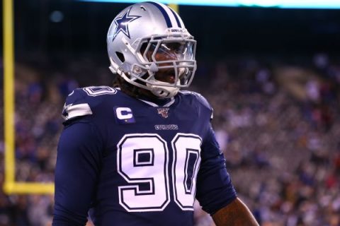 Cowboys’ Lawrence debating whether to report