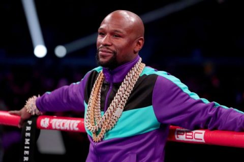 Mayweather critical of number of title belts