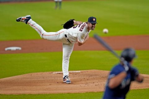 Astros’ Verlander out with strain, hopes to return