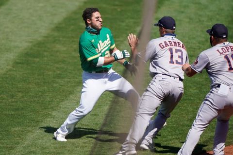 A’s Laureano charges Astros dugout, starts brawl