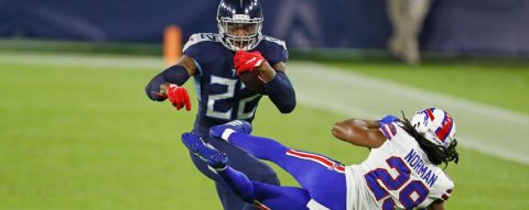 Stiff-arm? Titans running back Derrick Henry tosses Bills’ Josh Norman