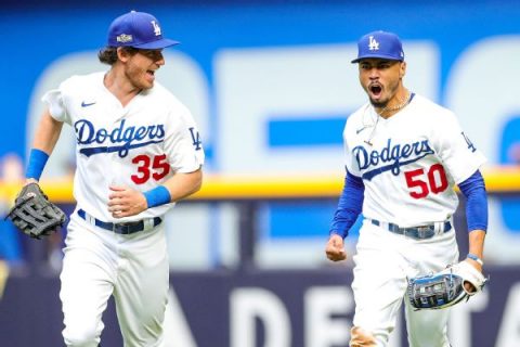 Book opens Dodgers with historic wins total