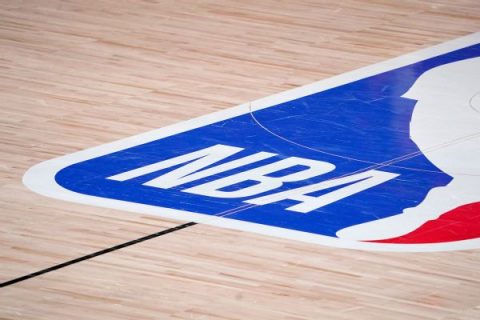 As rosters thin, NBA has no plans to halt season