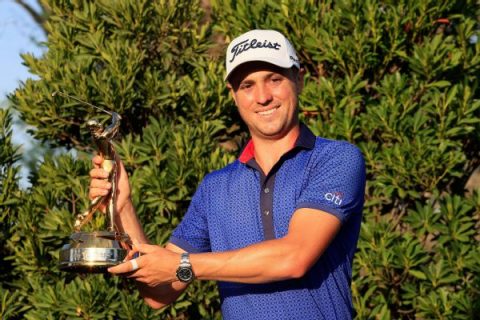 Thomas surges on back nine to win Players by 1