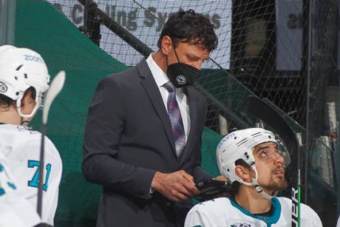 Sharks asst., unable to take vaccine, steps down